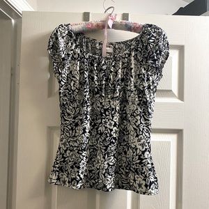 Navy blue and white floral blouse